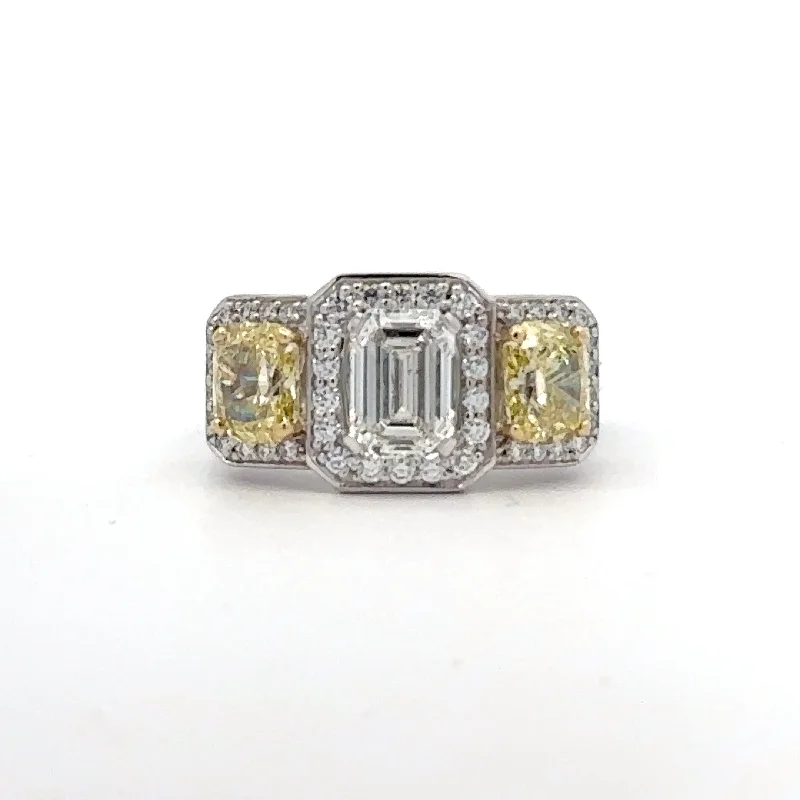 Emerald Cut Canadian Diamond Ring with Fancy Yellow Radiant Diamond Accents