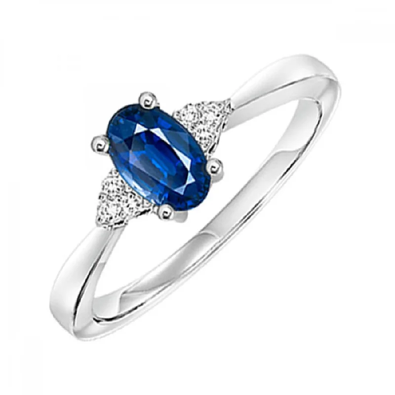 Oval-Shaped Sapphire Ring with Trios of Side Diamonds