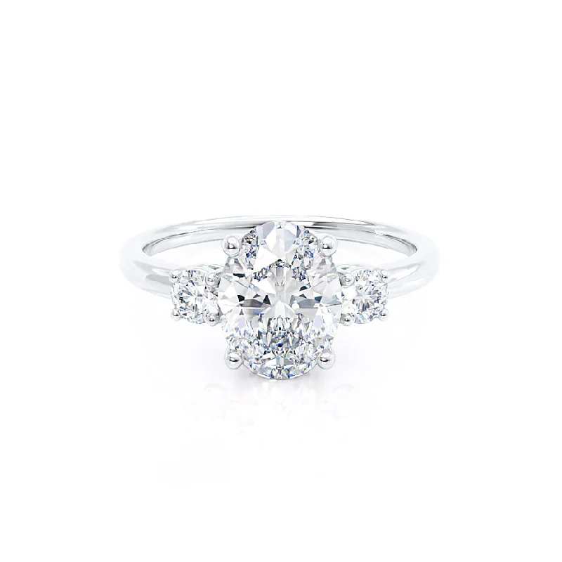 LOUELLA - Moissanite Oval Petite Trilogy Engagement Ring 18k White Gold