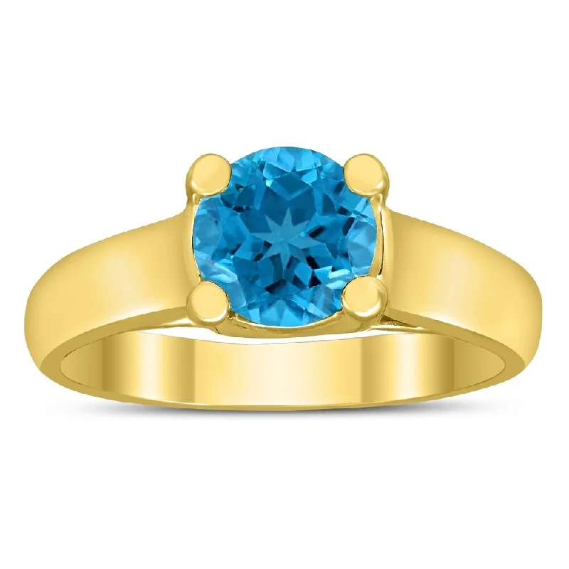 Round 7MM Blue Topaz Cathedral Solitaire Ring in 10K Yellow Gold